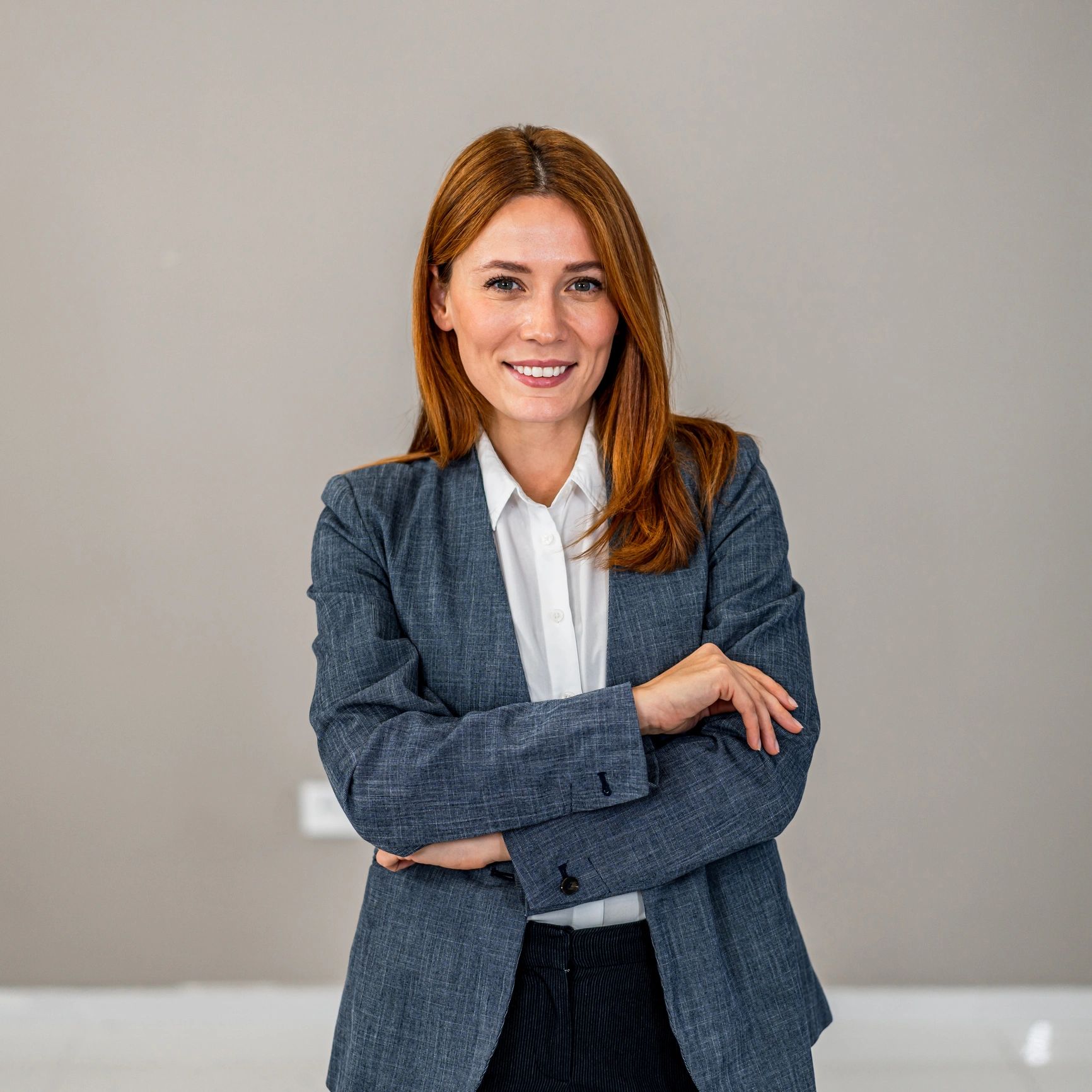 Professional headshot of a smiling woman